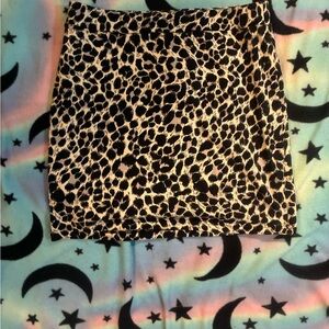 Divided Black and Cream Leopard Mini Skirt